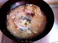 酸菜炖三文鱼头的做法步骤6